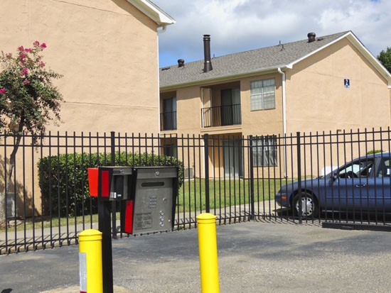 Ashton Pines Apartments gate entrance into complex with keypad